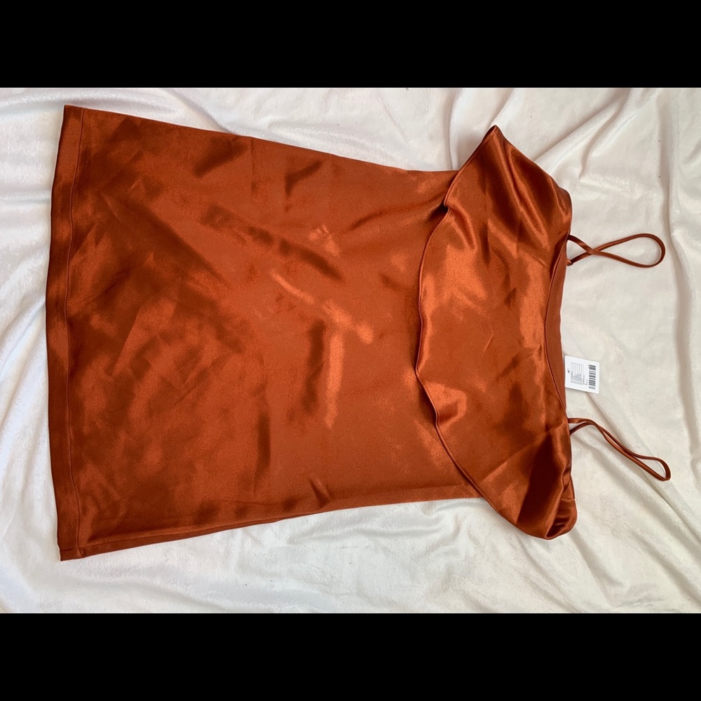 Orange dress with ruffle overlay